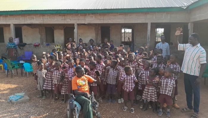 Adangabey brightens rural kids’ future from his wheelchair